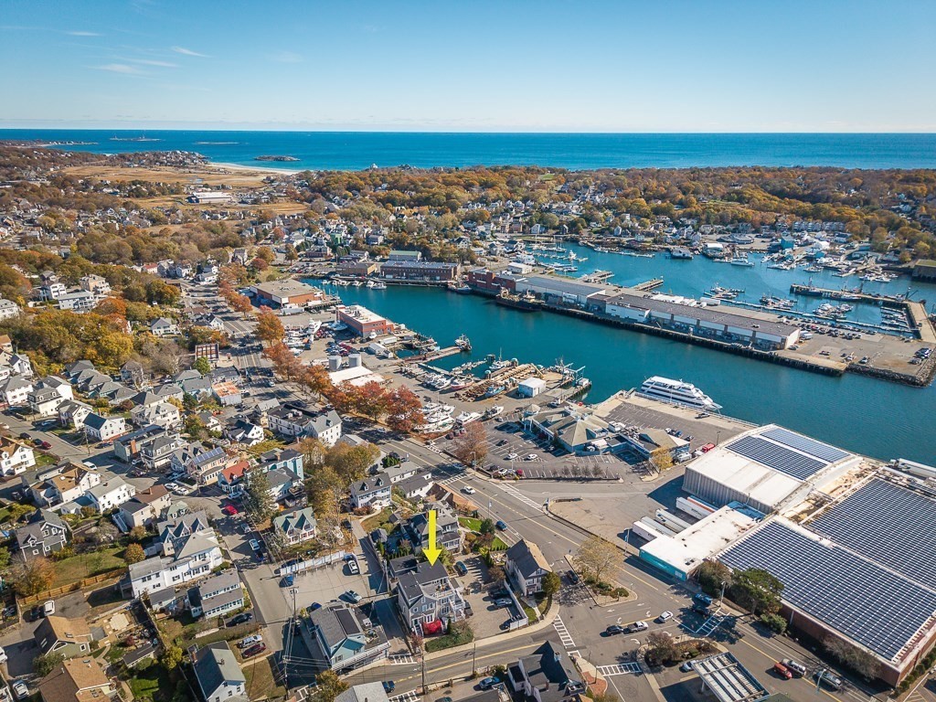 160 Prospect Street, Unit 3 Gloucester, MA 01930 - Photo 21 of 22 an aerial view of a city with ocean view in back