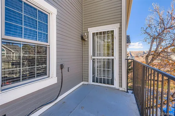 a view of a balcony with a window