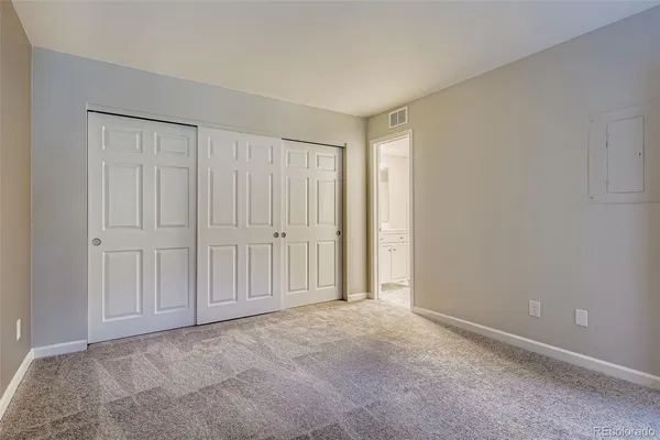 a view of an empty room and entryway