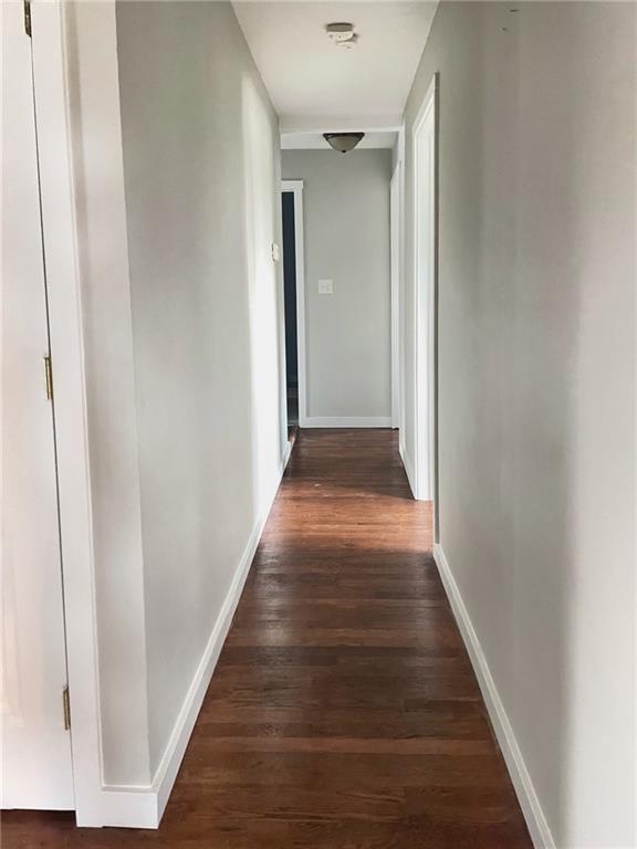 720 Gardner Center Road New Castle, PA 16101 - Photo 8 of 19 a view of a hallway with wooden floor