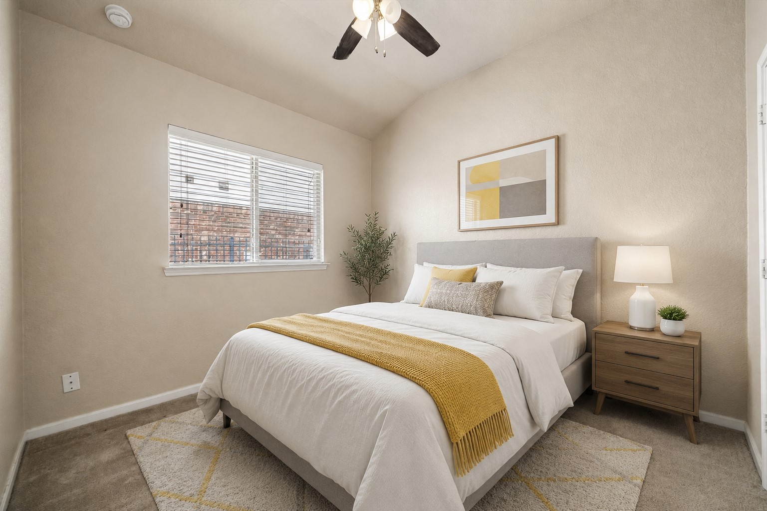 7806 Summer Night Lane Rosenberg, TX 77469 - Photo 18 of 23 This third bedroom features built-in wall shelving, neutral-toned carpeting, and a large window with horizontal blinds for natural light. **This room has been virtually staged.