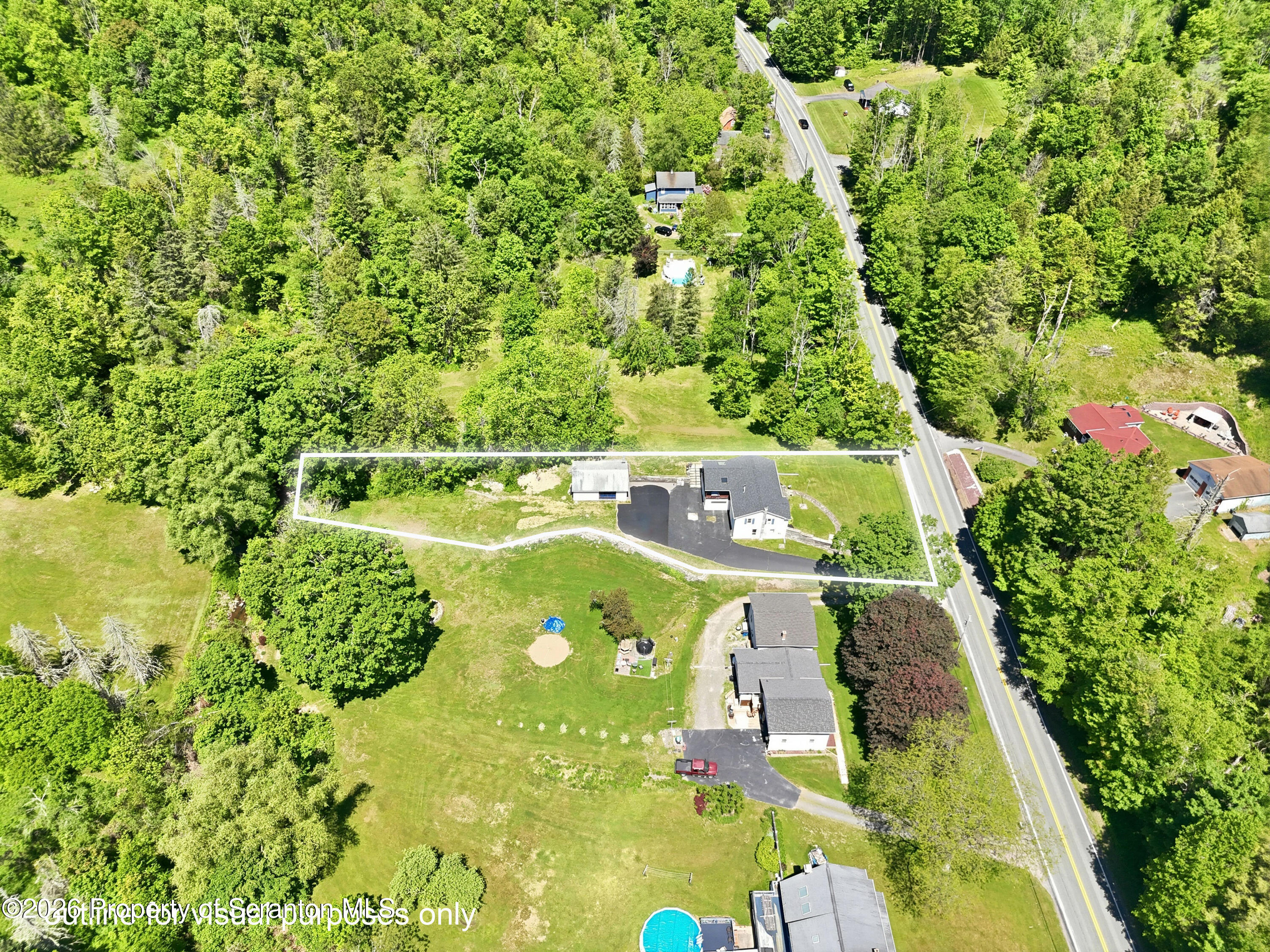 1237 Heart Lake Road Scott Township, PA 18433 - Photo 35 of 39 a view of swimming pool with a yard