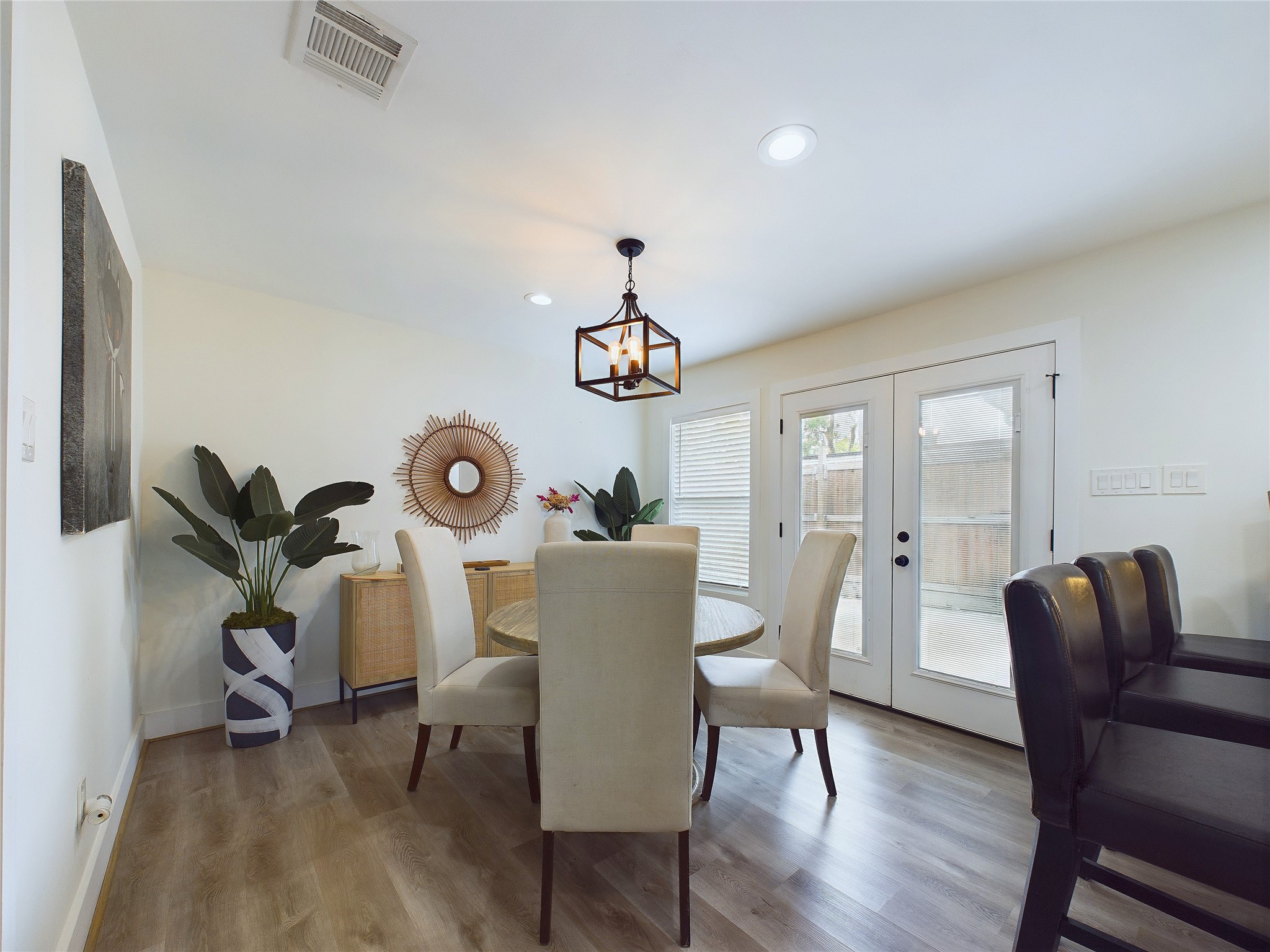7609 Amelia Road Houston, TX 77055 - Photo 9 of 29 Double doors provide access to the outdoors