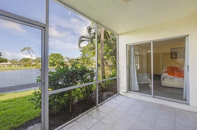 209 Bobolink Way, Unit A Naples, FL 34105 - Photo 7 of 17 a view of a room with balcony