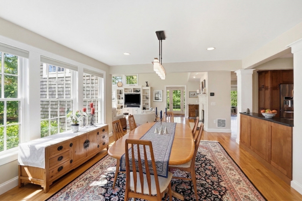 25 Bold Meadow Road Edgartown, MA 02539 - Photo 11 of 40 a view of a dining room with furniture window and wooden floor