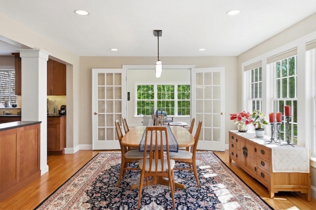 25 Bold Meadow Road Edgartown, MA 02539 - Photo 12 of 40 a view of a dining room with furniture window and wooden floor