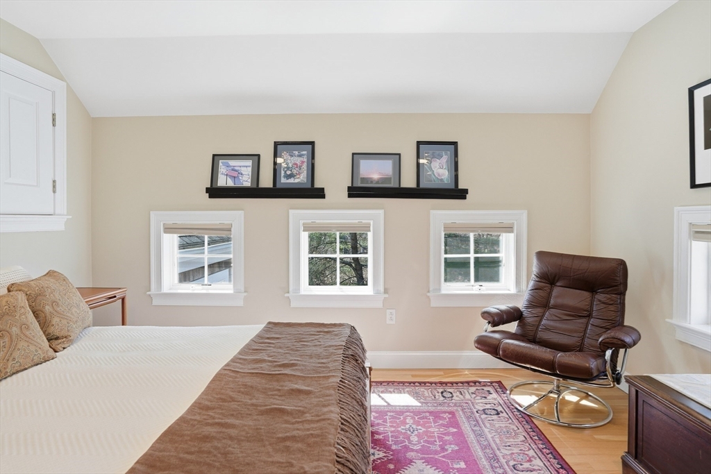 25 Bold Meadow Road Edgartown, MA 02539 - Photo 19 of 40 a bedroom with furniture and a window