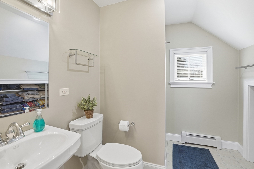 25 Bold Meadow Road Edgartown, MA 02539 - Photo 27 of 40 a white toilet sitting next to a bathroom sink