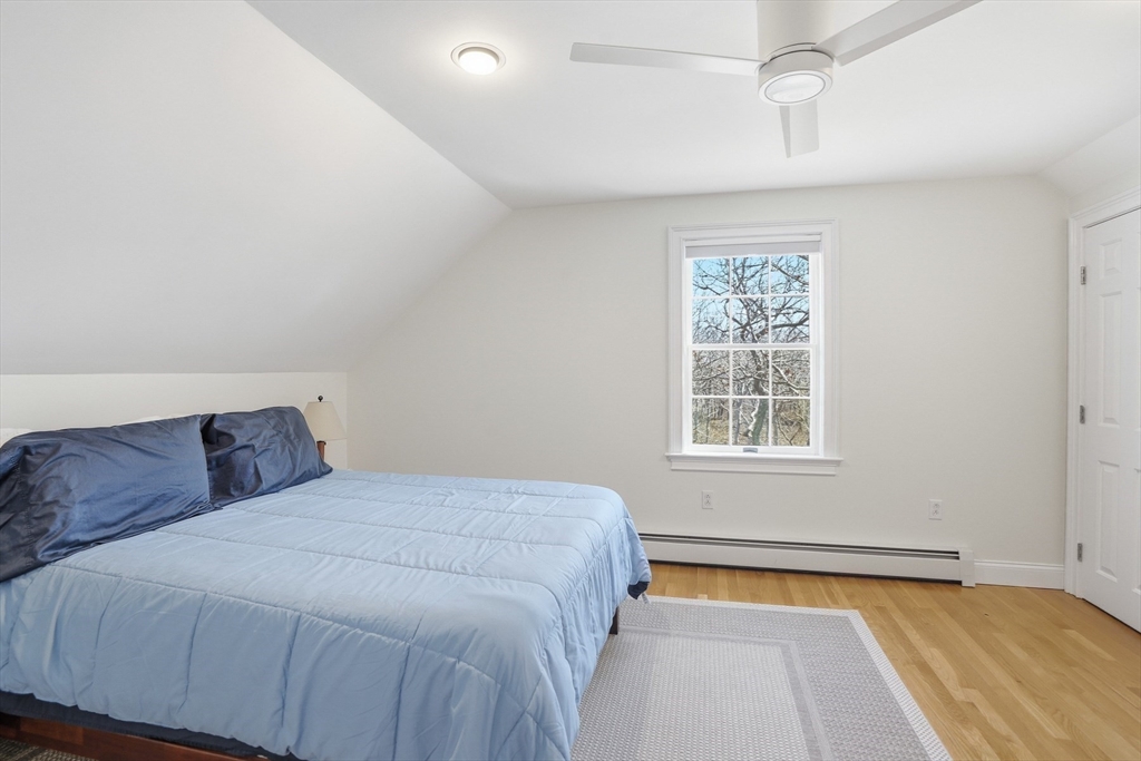 25 Bold Meadow Road Edgartown, MA 02539 - Photo 28 of 40 a bedroom with a bed and a window