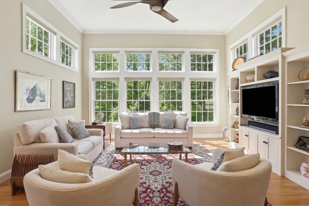 25 Bold Meadow Road Edgartown, MA 02539 - Photo 6 of 40 a living room with furniture a flat screen tv and a large window
