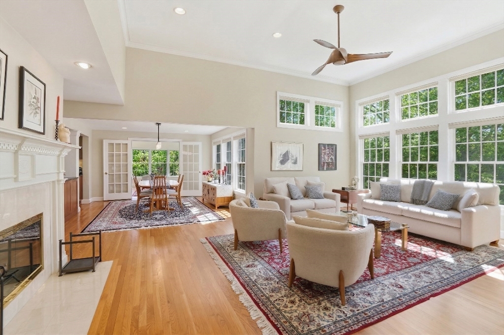 25 Bold Meadow Road Edgartown, MA 02539 - Photo 7 of 40 a living room with fireplace furniture and a large window