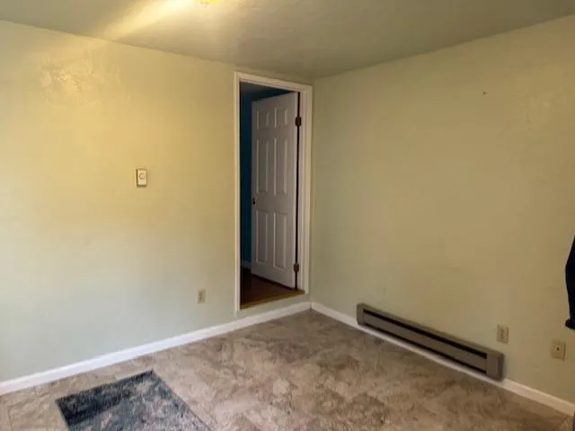 an empty room with a workbench