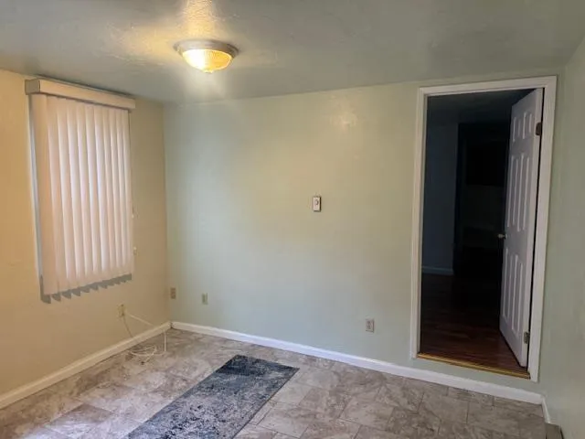 an empty room with windows