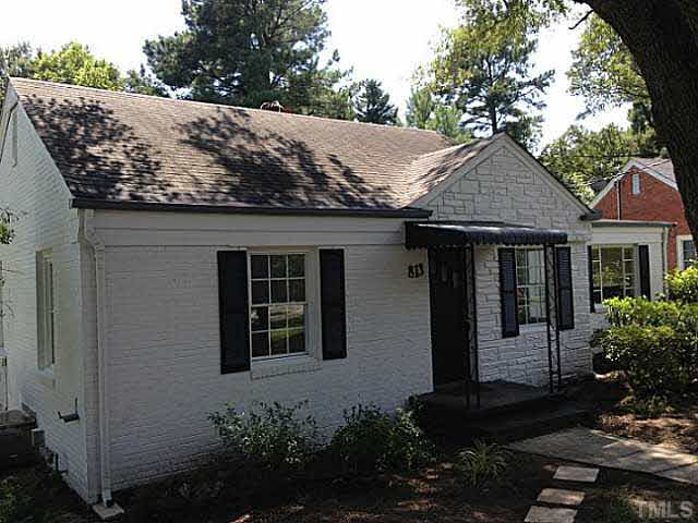 813 Welford Road Raleigh, NC 27610 - Photo 1 of 17 a front view of a house with garden