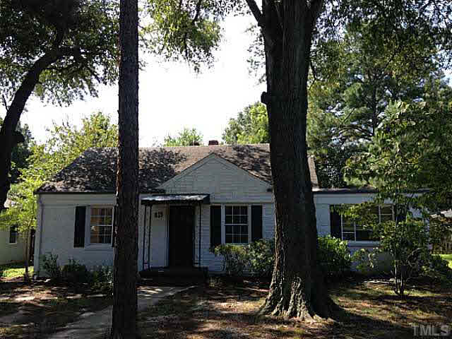 813 Welford Road Raleigh, NC 27610 - Photo 15 of 17 a front view of a house with garden