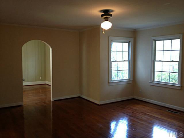 813 Welford Road Raleigh, NC 27610 - Photo 2 of 17 a view of empty room with wooden floor and fan