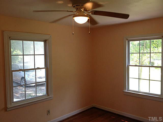 813 Welford Road Raleigh, NC 27610 - Photo 9 of 17 an empty room with a window