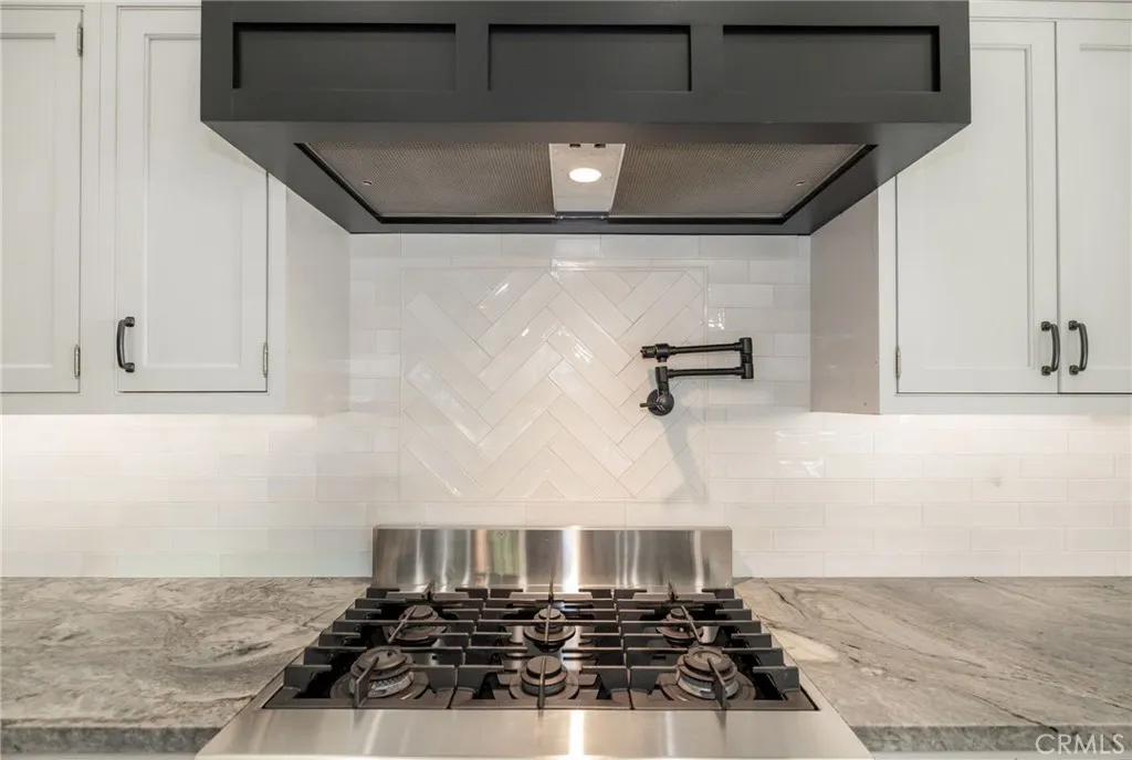 1720 Vista Del Lago, Unit 2 Fallbrook, CA 92028 - Photo 17 of 54 a kitchen with a stove and a cabinets