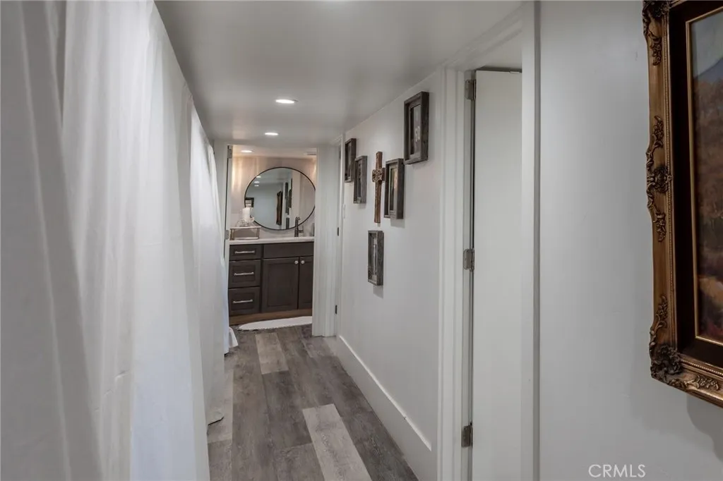 1720 Vista Del Lago, Unit 2 Fallbrook, CA 92028 - Photo 23 of 54 a view of hallway with wooden floor