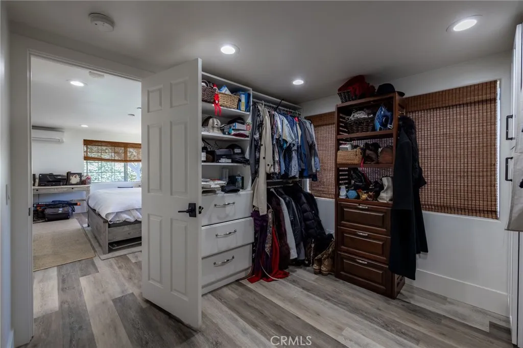 1720 Vista Del Lago, Unit 2 Fallbrook, CA 92028 - Photo 31 of 54 a view of walk in closet with clothes and shoes