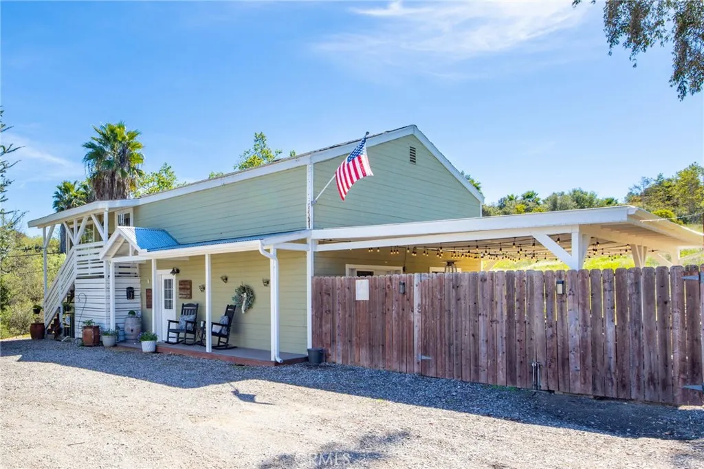 1720 Vista Del Lago, Unit 2 Fallbrook, CA 92028 - Photo 5 of 54 a view of a house with wooden fence