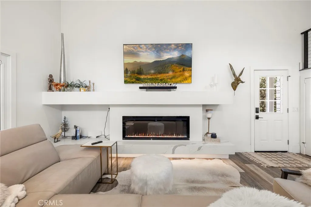 1720 Vista Del Lago, Unit 2 Fallbrook, CA 92028 - Photo 9 of 54 a living room with furniture and a fireplace