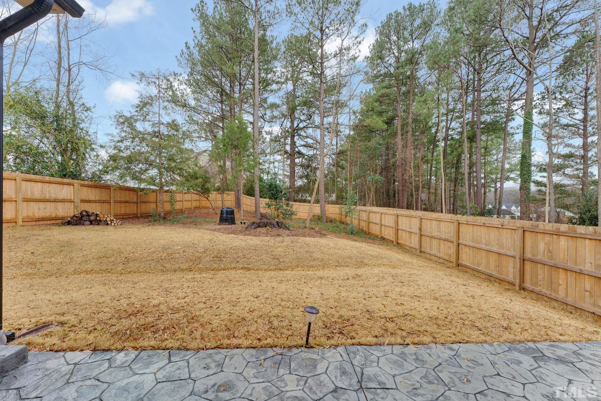 928 Barringer Drive Raleigh, NC 27606 - Photo 29 of 32 a view of yard with trees