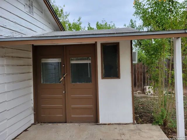 a view of a house with a patio