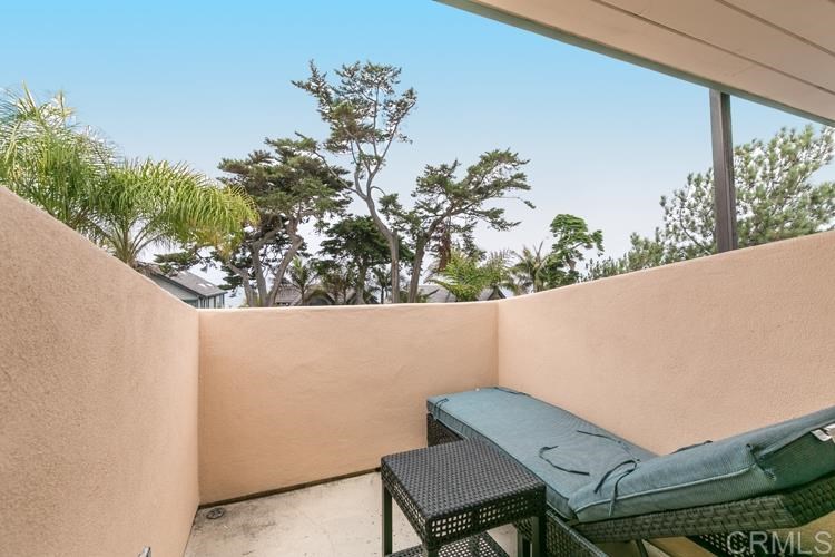 1407 Ocean Avenue Del Mar, CA 92014 - Photo 7 of 9 a view of balcony with wooden floor and outdoor seating