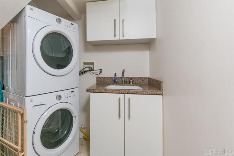 1407 Ocean Avenue Del Mar, CA 92014 - Photo 8 of 9 a utility room with sink dryer and washer