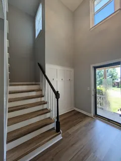 a view of entryway with wooden floor