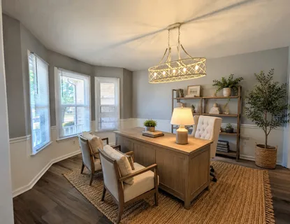 a large kitchen with cabinets and stainless steel appliances