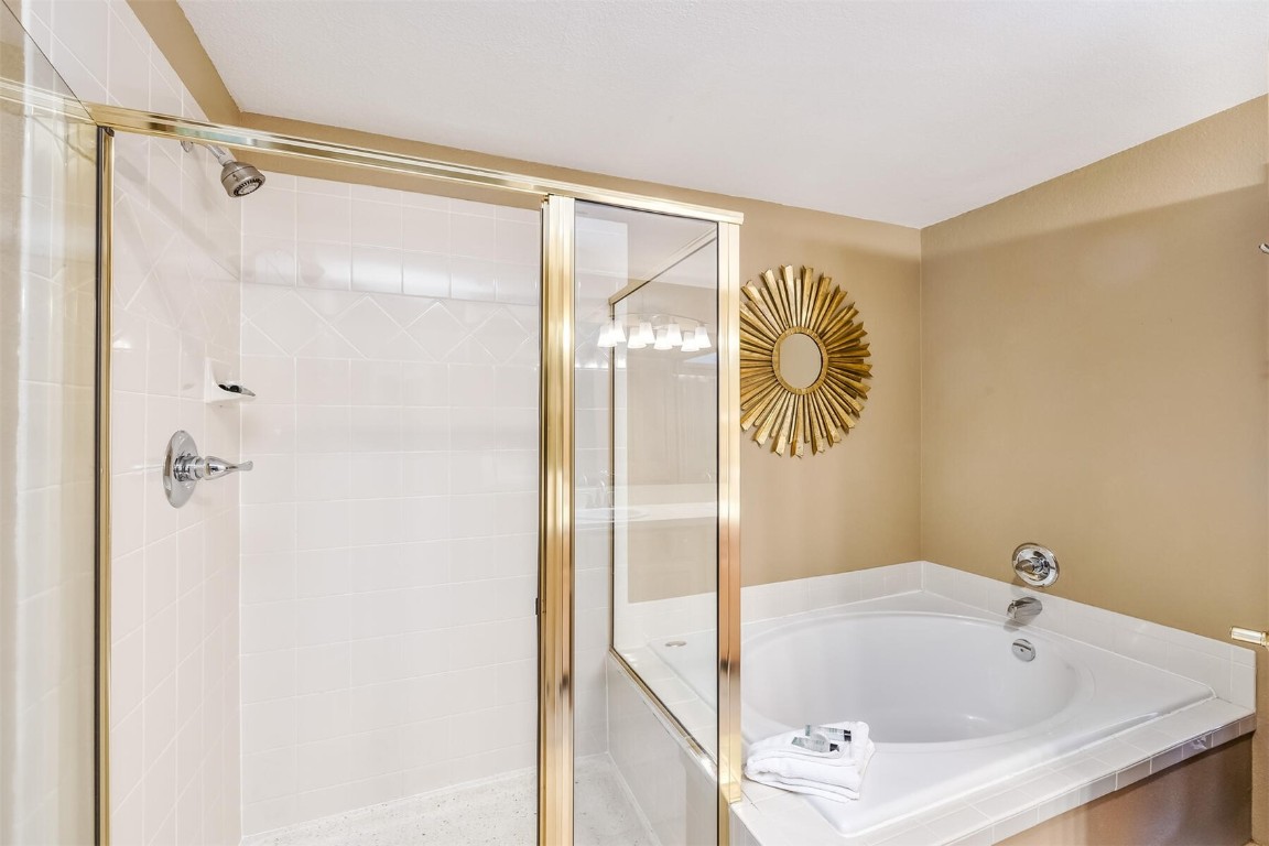 23110 Highway 6, Unit 5015 Keystone, CO 80435 - Photo 17 of 32 a bathroom with a tub and a shower