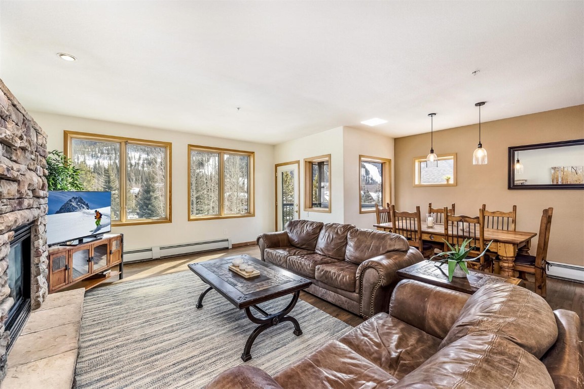23110 Highway 6, Unit 5015 Keystone, CO 80435 - Photo 4 of 32 a living room with furniture and a large window