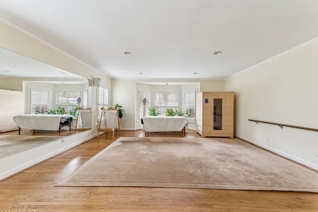 a bathroom with a shower sink and mirror
