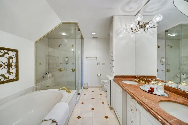 a bedroom with furniture and white walls