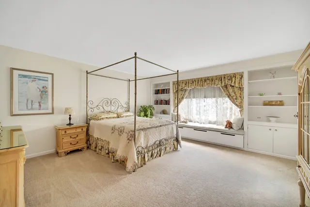 a view of a livingroom with furniture and window
