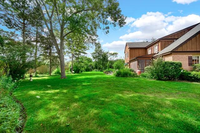 a view of a yard in front of a house