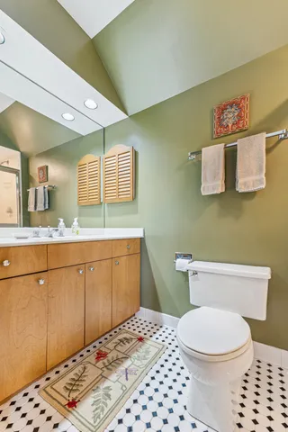 a room with gym equipment and pool table