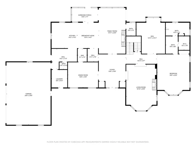 a front view of a house with a yard table and chairs