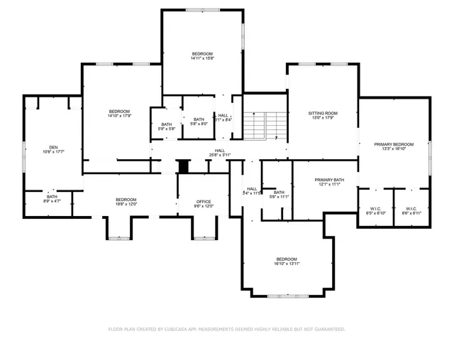 a view of a big house with a big yard and large trees