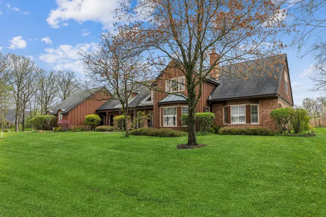 a house view with a garden space