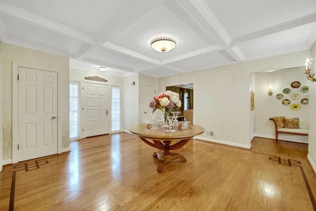 a view of a livingroom with furniture and lounge chair