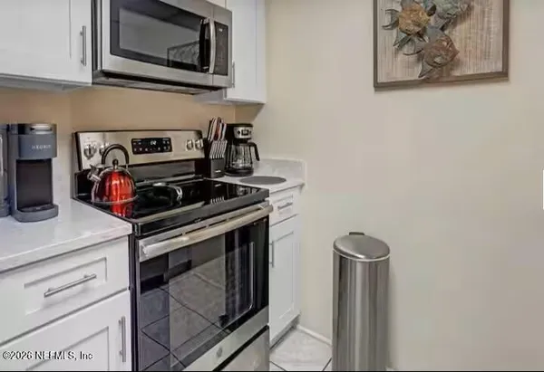a view of dining table and chairs