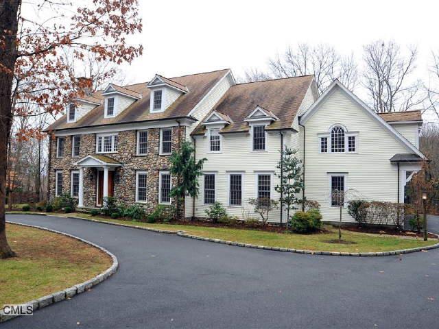 9 Old Dimon Road Redding, CT 06896 - Photo 1 of 1 a view of a white house with a large pool and large trees