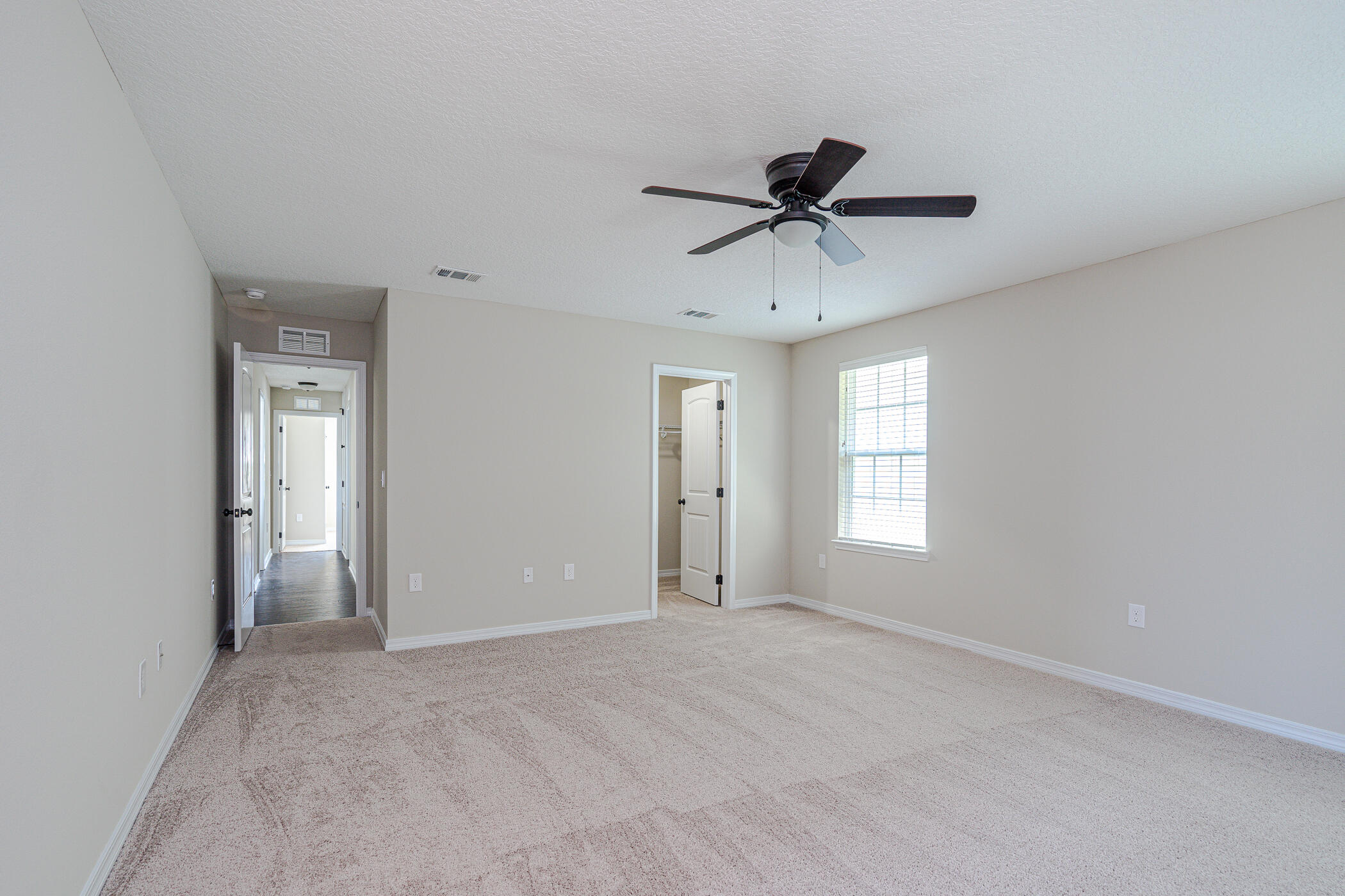 243 Wainwright Drive Crestview, FL 32539 - Photo 19 of 38 a view of a livingroom with a ceiling fan and window
