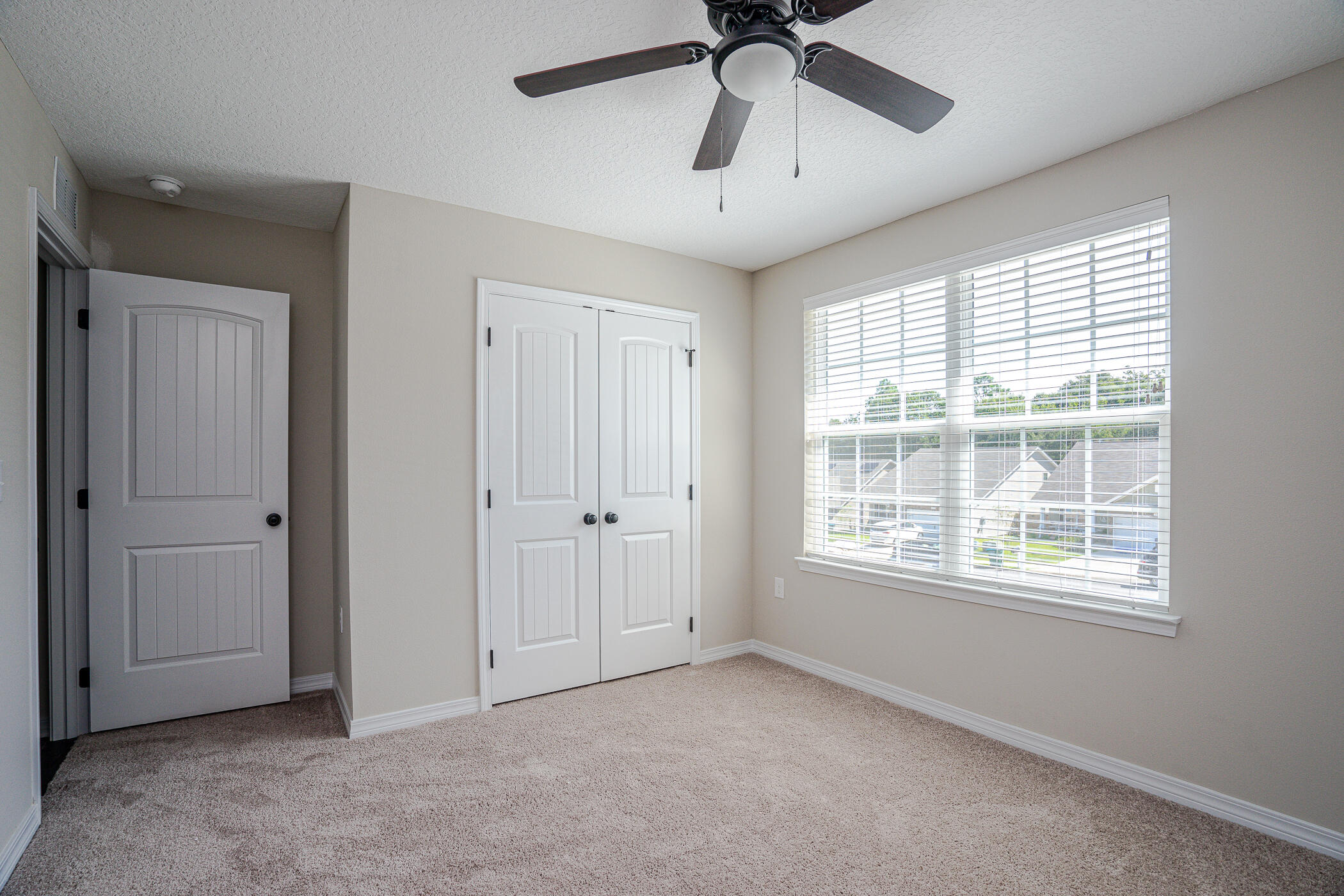 243 Wainwright Drive Crestview, FL 32539 - Photo 28 of 38 a view of an empty room with a window