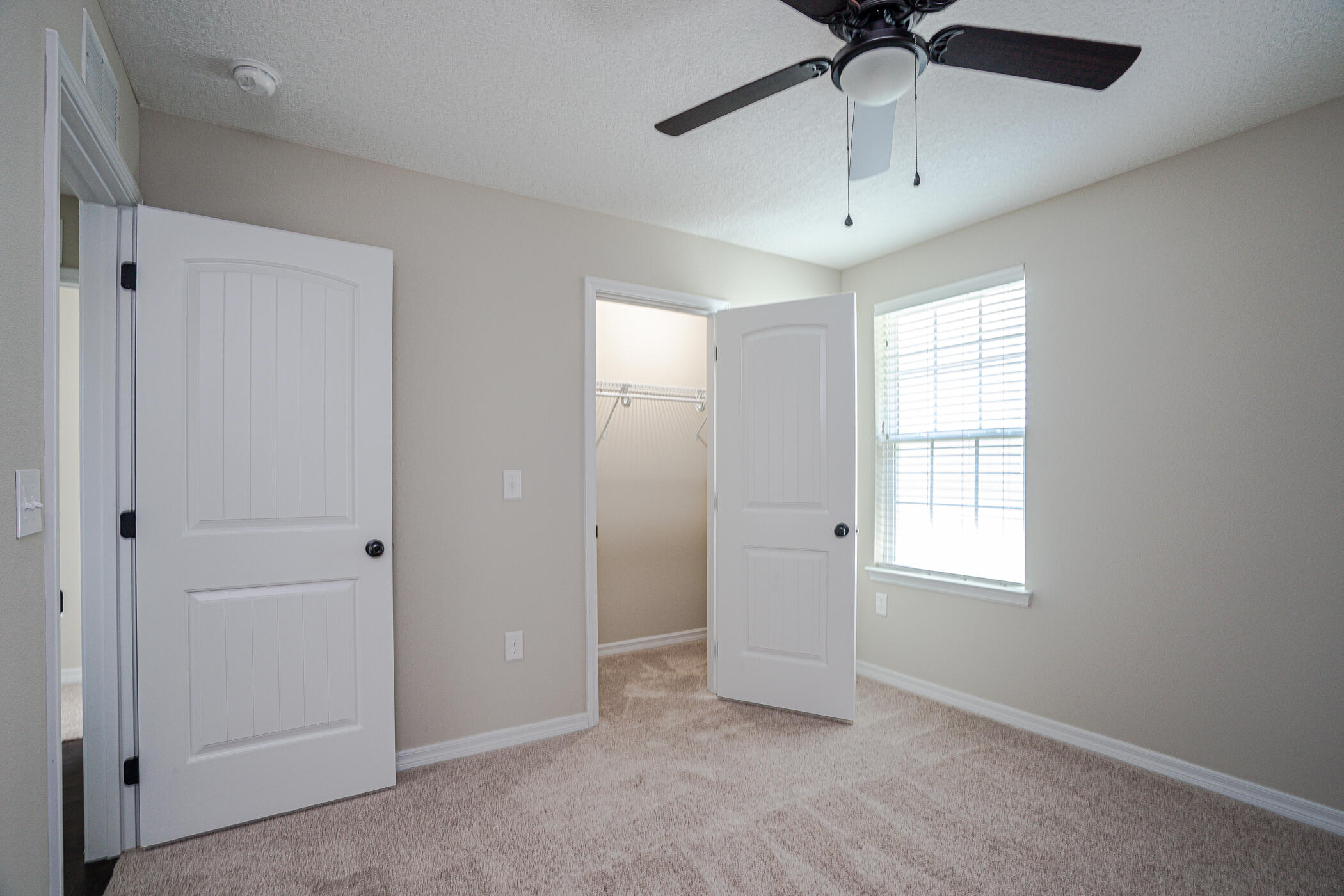 243 Wainwright Drive Crestview, FL 32539 - Photo 34 of 38 a view of an empty room with a window