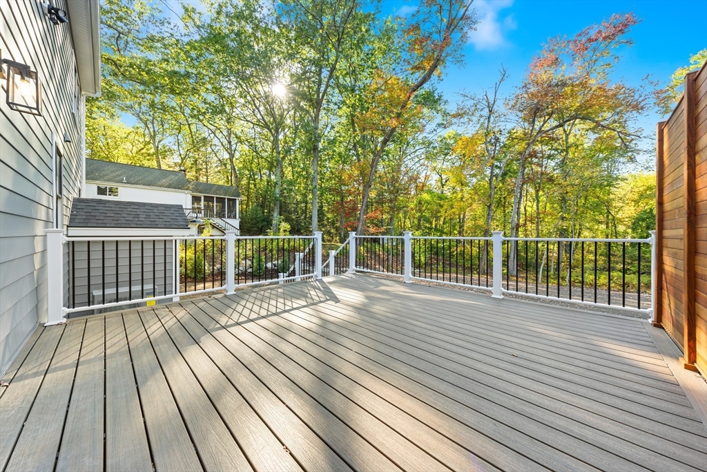 110 Wilson Road Bedford, MA 01730 - Photo 16 of 37 a view of a wooden deck