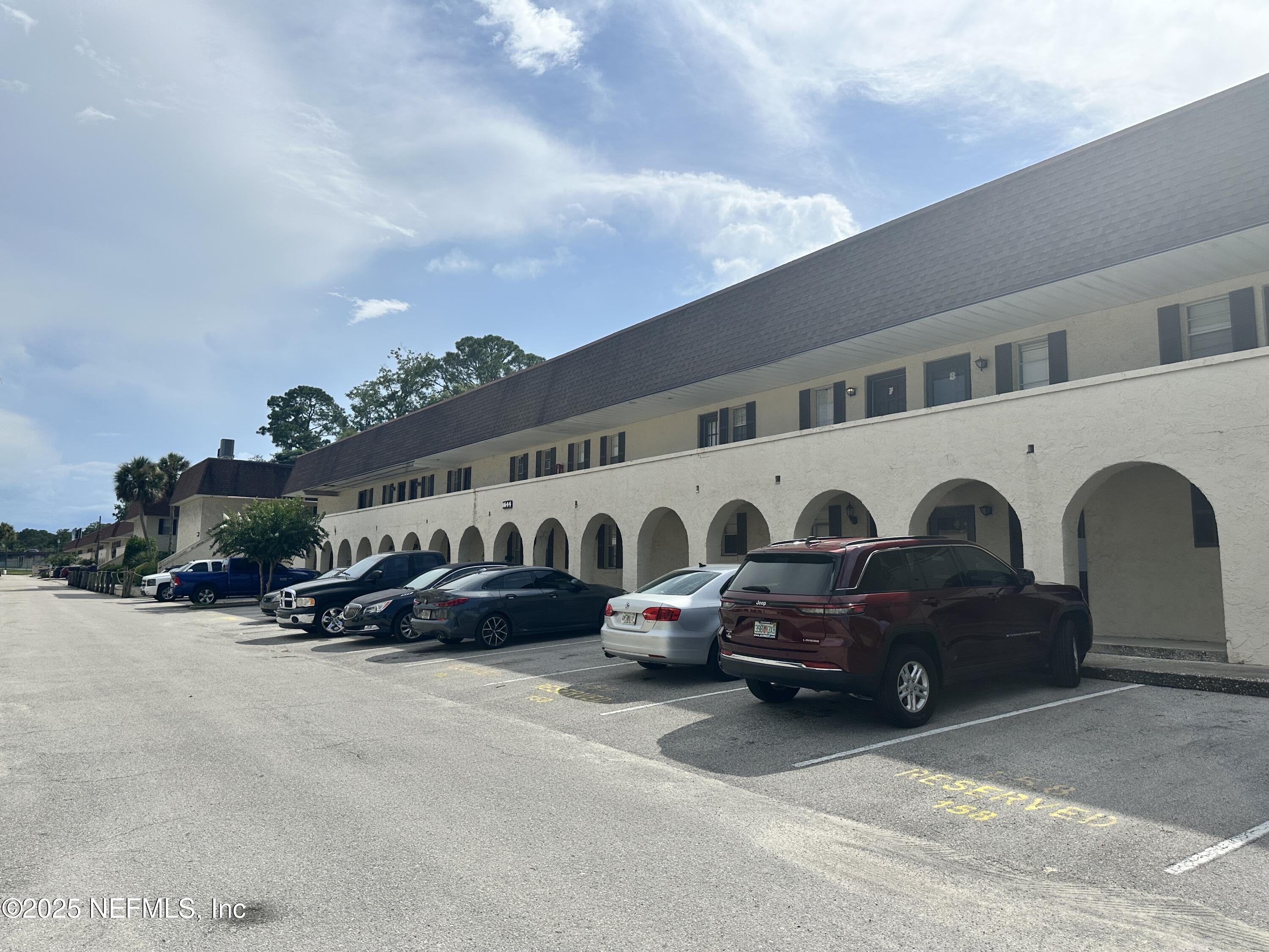 1644 El Camino Road, Unit 5 Jacksonville, FL 32216 - Photo 14 of 15 a view of a car park in front of house